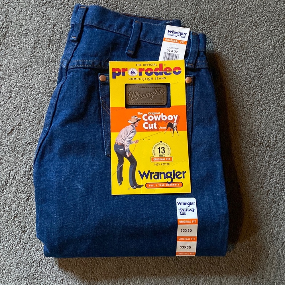 Wrangler, “The original cowboy cut” dark blue jeans